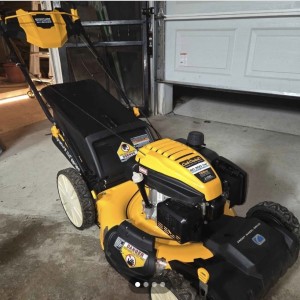 yellow push lawnmower